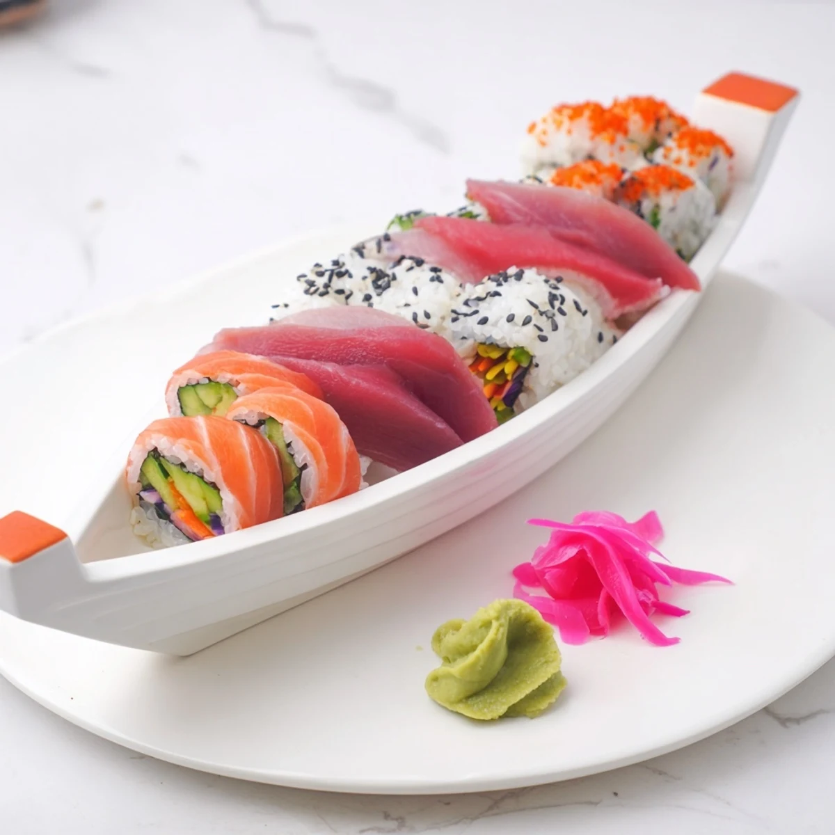 Sail Away Boat-Shaped Sushi Platter, a beautifully arranged sushi boat overflowing with fresh sashimi and rolls.