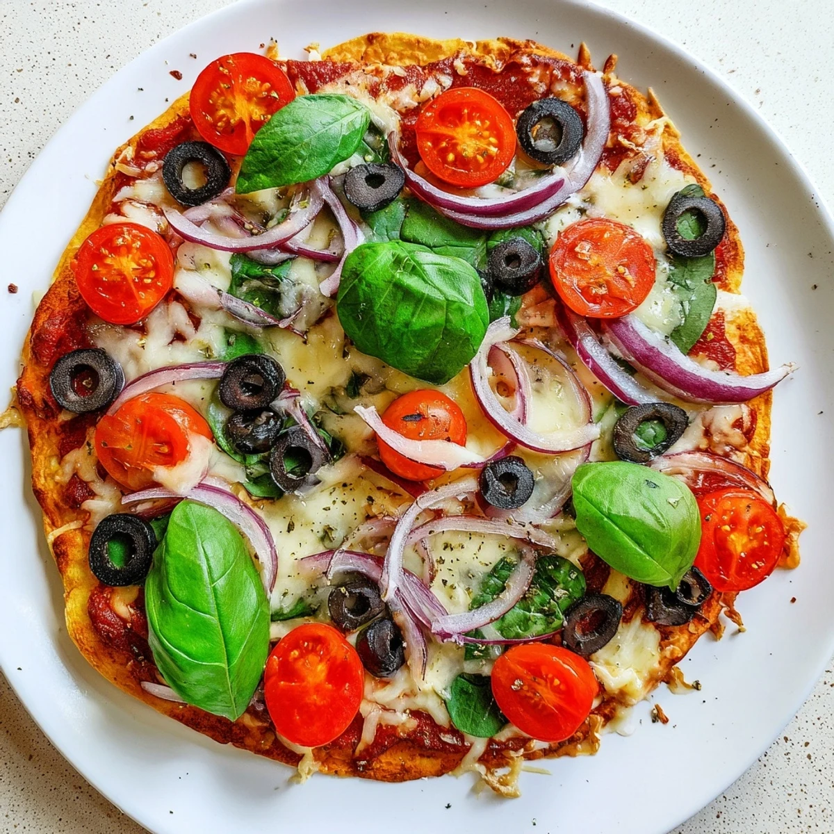 Enjoy a quick and easy Crispy Tortilla Pizza, perfect for a weeknight meal and vegetarian diners.