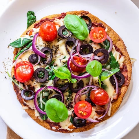 Golden-brown Crispy Tortilla Pizza, fresh from the oven, with melted cheese and vibrant toppings.